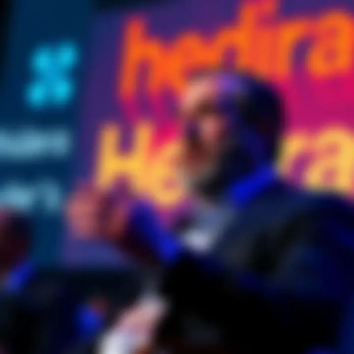Garlinghouse Adopts Hedera's Slogan Ripple CEO Garlinghouse speaking at a conference, with Hedera's slogan displayed in the background