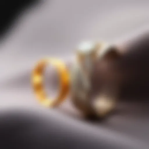 A close-up of a yellow gold ring and a white gold ring side by side, showing the size difference. The yellow gold ring is size 6.5 while the white gold ring is size 5, highlighting the mix-up in the o...