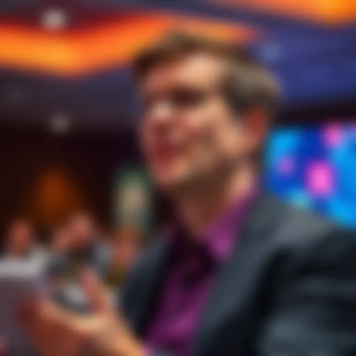 Dr. Leemon Baird speaking at a conference about quantum threats to blockchain security, with a focused expression and audience in the background.