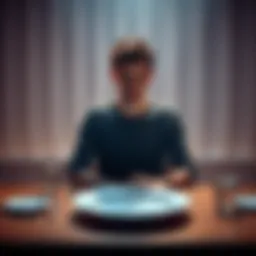 A person sitting calmly at a table with an empty plate, reflecting on their fasting journey for misophonia relief.