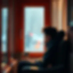 A person sitting in a cozy spot, lost in thought with a cup of coffee, looking out a window.